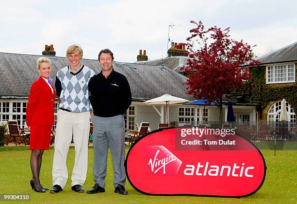 Professional Craig Laurence and amateur James Beardwell of Stock Brook Manor together with Virgin Crew pose for photographs after winning the the...