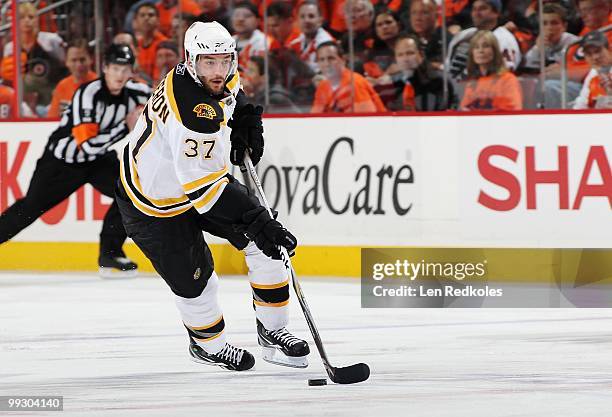 Patrice Bergeron of the Boston Bruins skates with the puck against the Philadelphia Flyers in Game Six of the Eastern Conference Semifinals during...