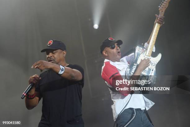 Singer and guitarist of Prophets of rage band, Chuck-D and Tom Morello, performs on stage during the 30th Eurockeennes rock music festival on July 6,...