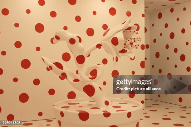 The installation 'With All My Love for the Tulips, I Pray Forever' by Japanese artist Yayoi Kusama can be seen in the exhibition in the David Zwirner...