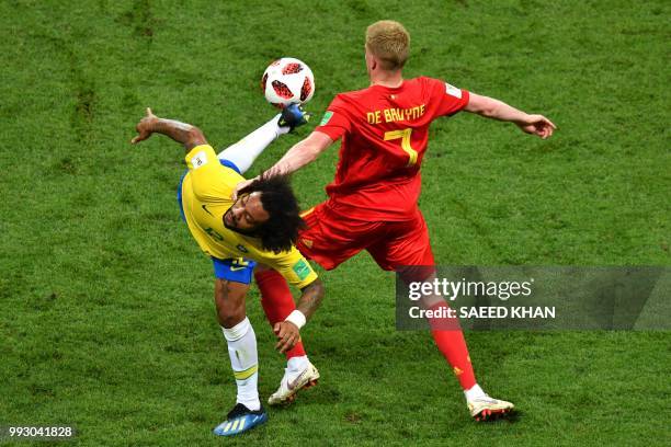 Brazil's defender Marcelo vies with Belgium's midfielder Kevin De Bruyne during the Russia 2018 World Cup quarter-final football match between Brazil...
