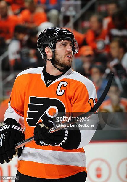 Mike Richards of the Philadelphia Flyers looks on during a timeout against the Boston Bruins in Game Six of the Eastern Conference Semifinals during...