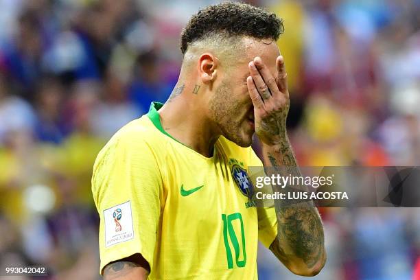 Brazil's forward Neymar reacts during the Russia 2018 World Cup quarter-final football match between Brazil and Belgium at the Kazan Arena in Kazan...