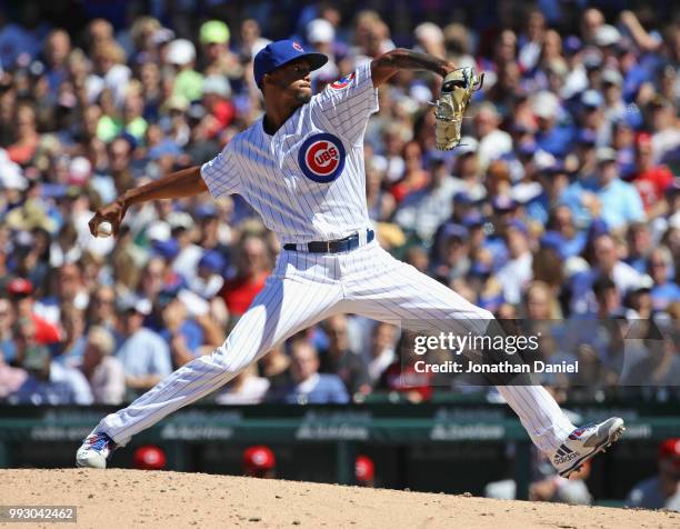 Carl Edwards Jr. #6 of the Chicago Cubs pitches in the 8th inning against the Cincinnati Reds at Wrigley Field on July 6, 2018 in Chicago, Illinois....