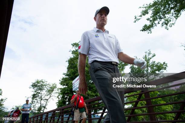 Jim Furyk walks to his second shot on the 17th hole during round two of A Military Tribute At The Greenbrier held at the Old White TPC course on July...