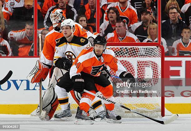 Michael Leighton and Kimmo Timonen of the Philadelphia Flyers battles in the crease with Vladimir Sobotka of the Boston Bruins in Game Six of the...