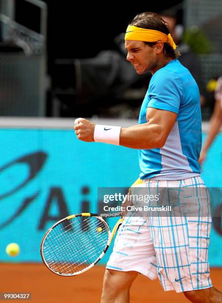 Rafael Nadal of Spain celebrates a point against Gael Monfils of France in their quarter final match during the Mutua Madrilena Madrid Open tennis...