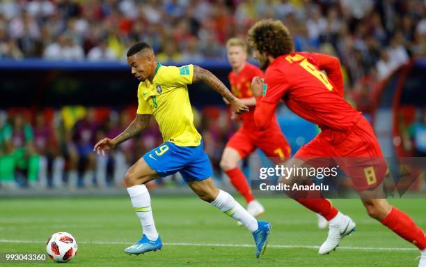 Gabriel Jesus of Brazil in action against Marouane Fellaini of Belgium during the 2018 FIFA World Cup Russia quarter final match between Brazil and...