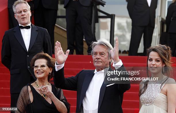 Italian actress Claudia Cardinale , French actor Alain Delon and his daughter Anoushka arrive for the screening of "Il Gattopardpo" presented during...