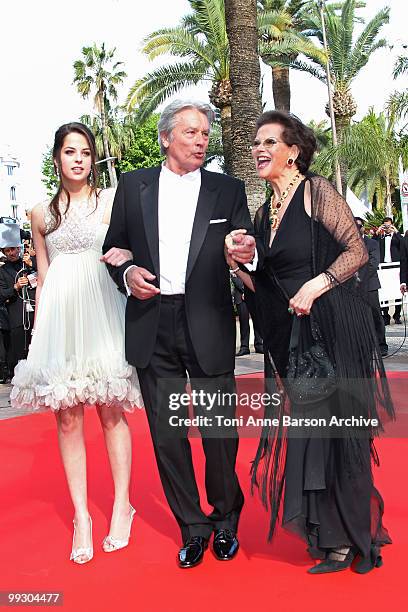 Anouchka Delon, actor Alain Delon and actress Claudia Cardinale attend the 'Il Gattopardo' premiere held at the Palais des Festivals during the 63rd...