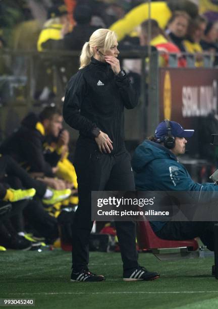 The fourth referee Bibiana Steinhaus on the sideline during the German Bundesliga soccer match between Borussia Dortmund and Bayern Munich at the...