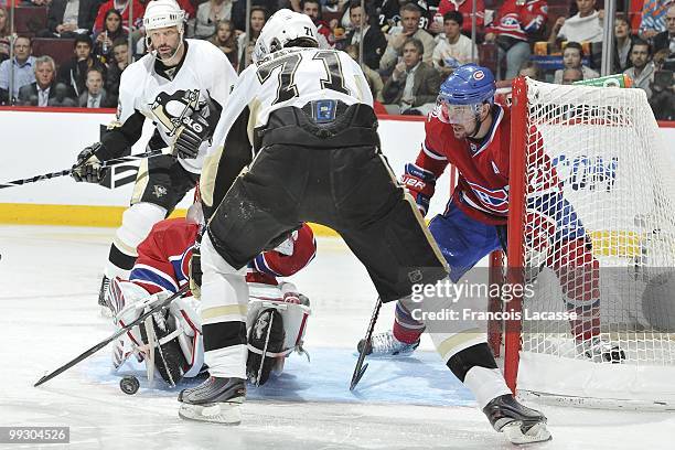 Evgeni Malkin of the Pittsburgh Penguins takes a shot on goalie Jaroslav Halak of Montreal Canadiens in Game Six of the Eastern Conference Semifinals...