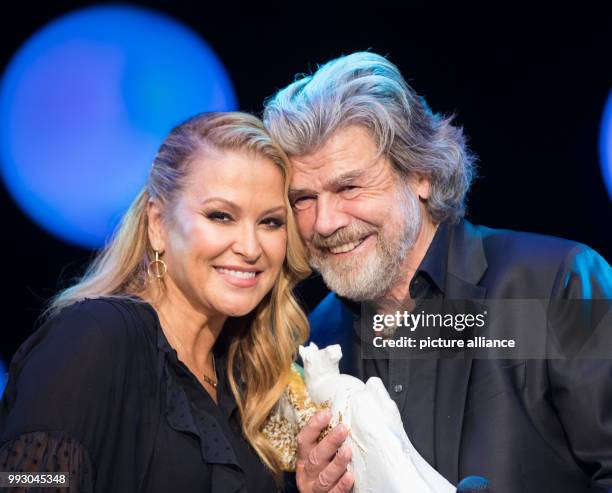 Singer Anastacia presents the mountain climber Reinhold Messner with the award for "legend in sports" in the Alte Oper in Frankfurt am Main, Germany,...