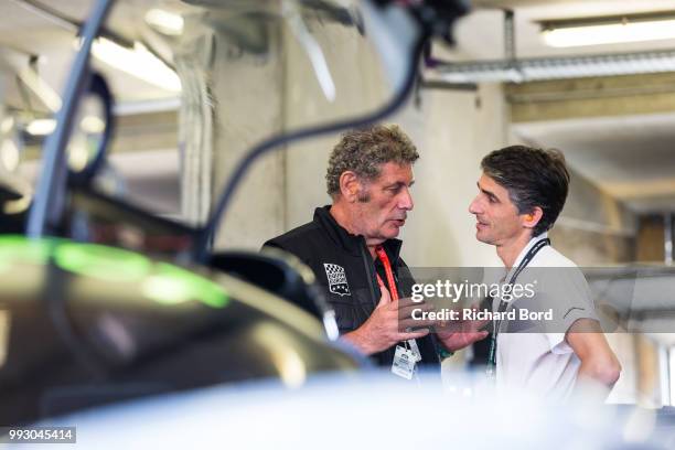 Equipe Europe founder and owner Yvan Mahe speaks with Richard Mille's Head of Marketing Tim Malachard during Le Mans Classic 2018 on July 6, 2018 in...