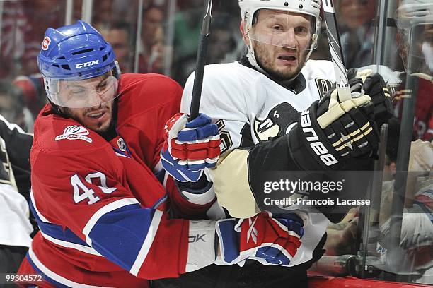 Maxim Lapierre of Montreal Canadiens collides with Sergei Gonchar of the Pittsburgh Penguins in Game Six of the Eastern Conference Semifinals during...