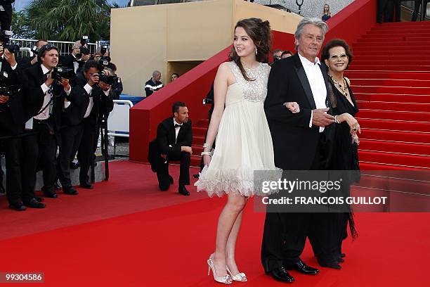 Italian actress Claudia Cardinale , French actor Alain Delon and his daughter Anoushka arrive for the screening of "Il Gattopardpo" presented during...