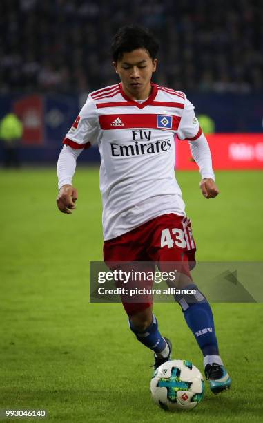 Hamburg's Tatsuya Ito in action during the German Bundesliga soccer match between Hamburger SV and VfB Stuttgart in the Volkspark stadium in Hamburg,...