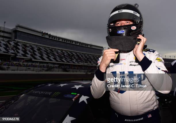 Brad Keselowski, driver of the Stars Stripes and Lites Ford, prepares to qualify for the Monster Energy NASCAR Cup Series Coke Zero Sugar 400 at...