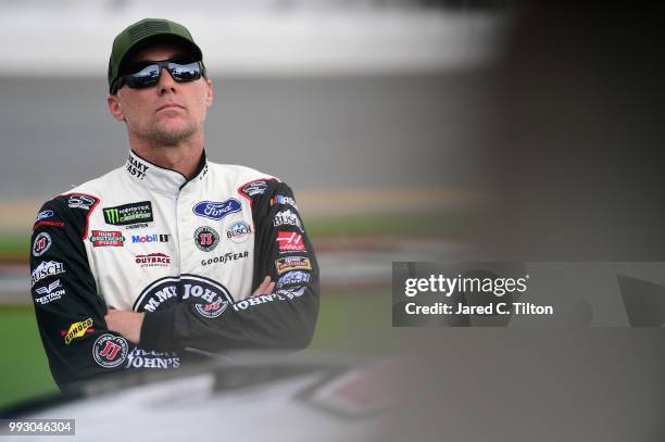 Kevin Harvick, driver of the Jimmy John's Kickin' Ranch Ford, looks on during qualifying for the Monster Energy NASCAR Cup Series Coke Zero Sugar 400...