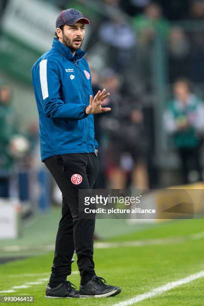 Mainz's coach Sandro Schwarz gesticulates on the edge of the field during the German Bundesliga soccer match between Borussia Moenchengladbach and...