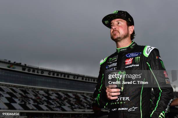 Kurt Busch, driver of the Monster Energy/Haas Automation Ford, stands on the grid during qualifying for the Monster Energy NASCAR Cup Series Coke...