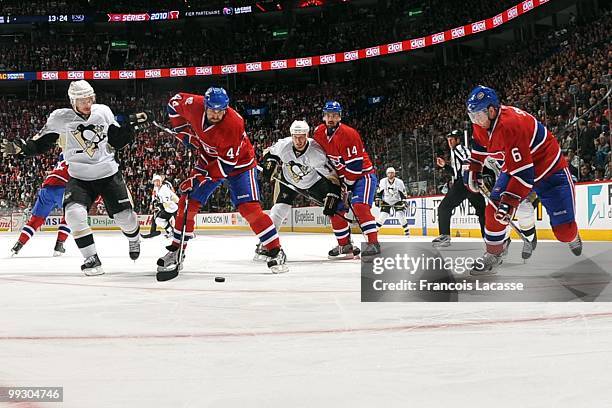 Roman Hamrlik of Montreal Canadiens makes a pass to teammate Jaroslav Spacek Game Six of the Eastern Conference Semifinals against the Pittsburgh...