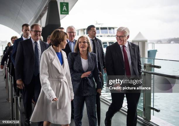 German President Frank-Walter Steinmeier and his wife Elke Buedenbender are greeted by the Australian Prime Minister's wife, Lucy Turnbull during...