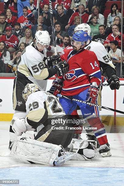 Marc-Andre Fleury of the Pittsburgh Penguins blocks a shot of Tomas Plekanec of Montreal Canadiens in Game Six of the Eastern Conference Semifinals...