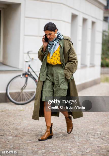 Leyla Piedayesh wearing olive green shorts, olive coat seen outside William Fan during the Berlin Fashion Week July 2018 on July 6, 2018 in Berlin,...