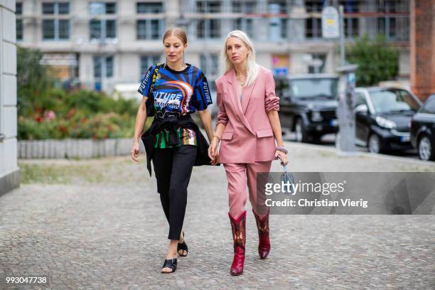 Lisa Banholzer and Cloudy Zakrocki seen outside William Fan during the Berlin Fashion Week July 2018 on July 6, 2018 in Berlin, Germany.