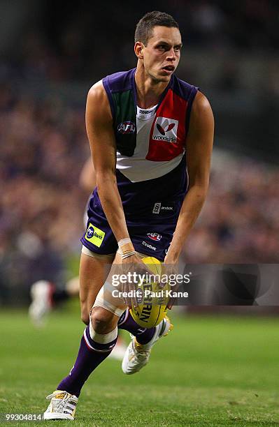 Michael Johnson of the Dockers looks for a pass during the round eight AFL match between the Fremantle Dockers and the Collingwood Magpies at Subiaco...