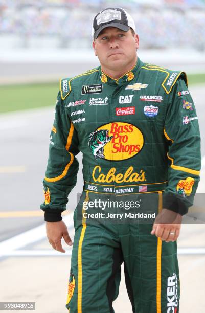 Ryan Newman, driver of the Bass Pro Shops/Cabela's Chevrolet, walks to his car during qualifying for the Monster Energy NASCAR Cup Series Coke Zero...