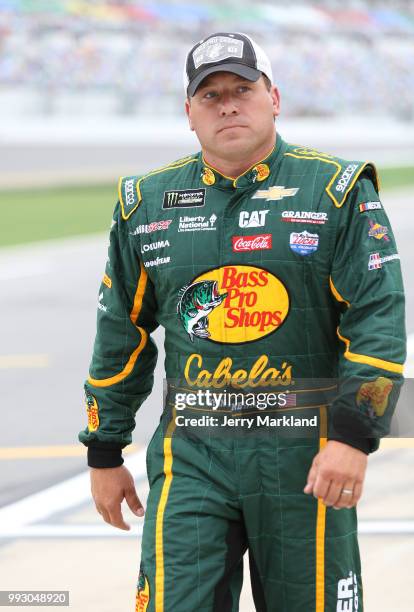 Ryan Newman, driver of the Bass Pro Shops/Cabela's Chevrolet, walks to his car during qualifying for the Monster Energy NASCAR Cup Series Coke Zero...