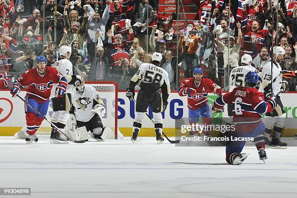 Travis Moen of Montreal Canadiens celebrates a goal with teammate Jaroslav Spacek in Game Six of the Eastern Conference Semifinals against the...
