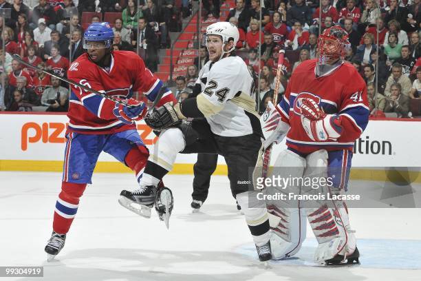 Matt Cooke of the Pittsburgh Penguins waits for a pass in front Jaroslav Halak of Montreal Canadiens in Game Six of the Eastern Conference Semifinals...