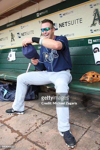 Evan Longoria of the Tampa Bay Rays joking "I cut my hair myself" in the dugout prior to the game against the Oakland Athletics at the Oakland...