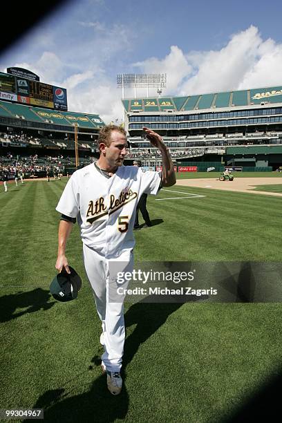 Dallas Braden of the Oakland Athletics celebrating after pitching a perfect game against the Tampa Bay Rays at the Oakland Coliseum on May 9, 2010 in...