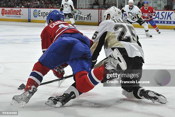 Mike Cammalleri of Montreal Canadiens battles for the puck with Maxime Talbot of the Pittsburgh Penguins in Game Six of the Eastern Conference...