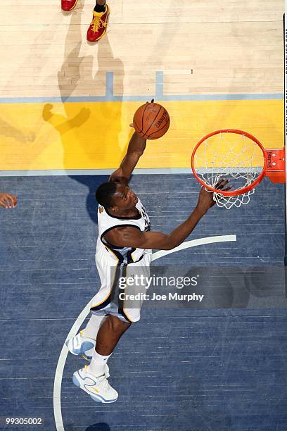 Hasheem Thabeet of the Memphis Grizzlies makes a dunk against the Houston Rockets during the game at the FedExForum on April 6, 2010 in Memphis,...