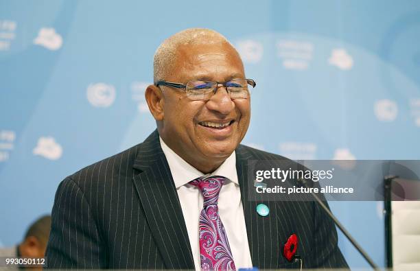 Dpatop - Fiji's Prime Minister and President of COP23/CMP13, Frank Bainimarama smiles as he delivers his speech during the opening of the UN World...