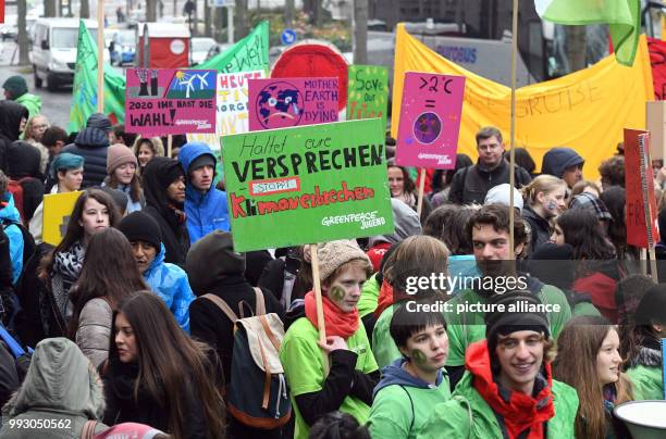 Youth hold banners during a Greenpeace protest on the opening day of the UN Climate Change Conference COP23, in Bonn, Germany, 06 November 2017.The...