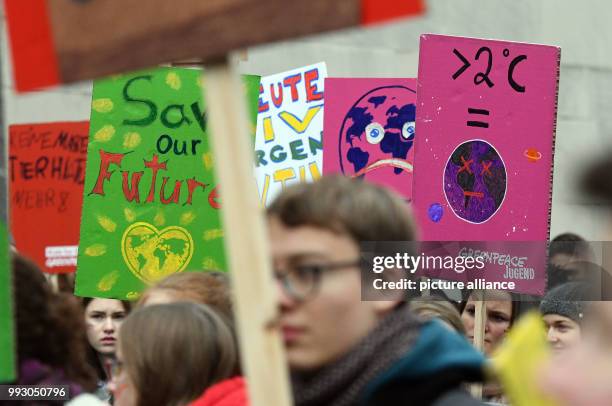 Youth hold banners during a Greenpeace protest on the opening day of the UN Climate Change Conference COP23, in Bonn, Germany, 06 November 2017.The...