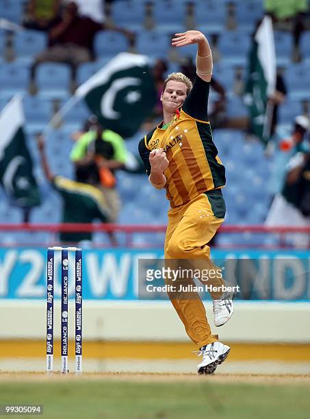 Steven Smith of Australia bowls during the semi final of the ICC World Twenty20 between Australia and Pakistan at the Beausejour Cricket Ground on...