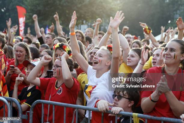 Belgian soccer fans celebrate first goal of Belgium National team "Les Diables Rouges" during FIFA WC 2018 Belgium vs Brasil at Tournai Fan Zone on...