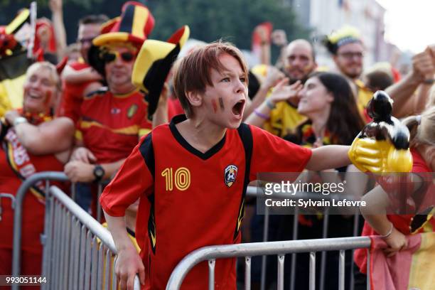 Belgian soccer fans celebrate second goal of Belgium National team "Les Diables Rouges" during FIFA WC 2018 Belgium vs Brasil at Tournai Fan Zone on...
