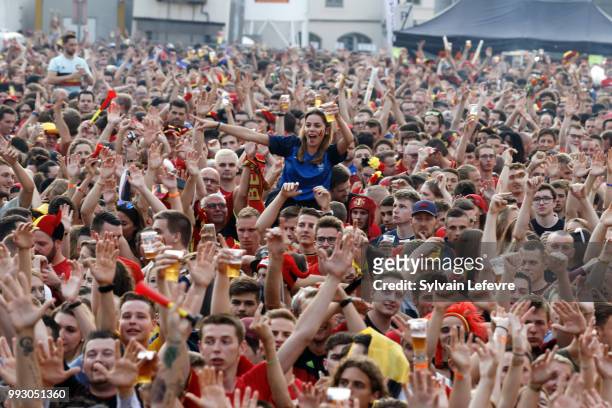 French and Belgian soccer fans celebrate winning of Belgium National team "Les Diables Rouges" during FIFA WC 2018 Belgium vs Brasil at Tournai Fan...