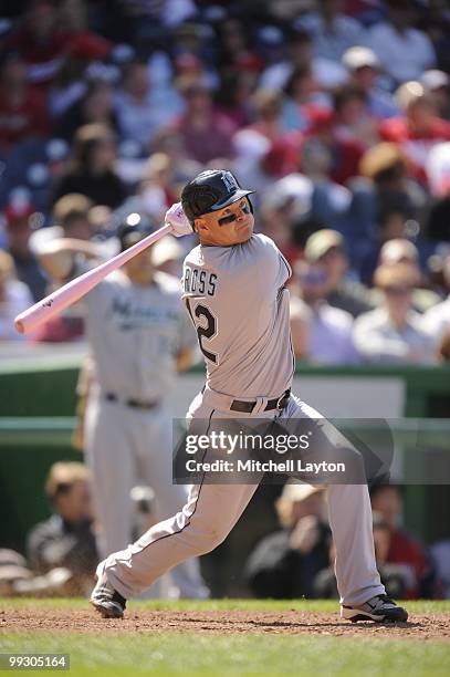 Cody Ross of the Florida Marlins takes a swing during a baseball game against the Washington Nationals on May 9, 2010 at Nationals Park in...