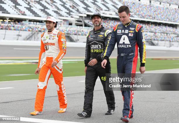 Chase Elliott, driver of the Hooters Chevrolet, Jimmie Johnson, driver of the Lowe's for Pros Chevrolet, and Alex Bowman, driver of the Axalta...
