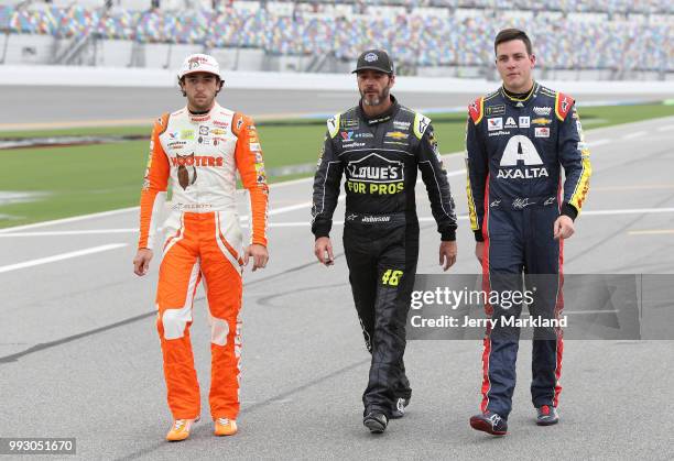 Chase Elliott, driver of the Hooters Chevrolet, Jimmie Johnson, driver of the Lowe's for Pros Chevrolet, and Alex Bowman, driver of the Axalta...