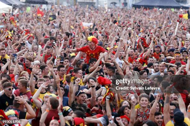 Belgian soccer fans celebrate winning of Belgium National team "Les Diables Rouges" during FIFA WC 2018 Belgium vs Brasil at Tournai Fan Zone on July...